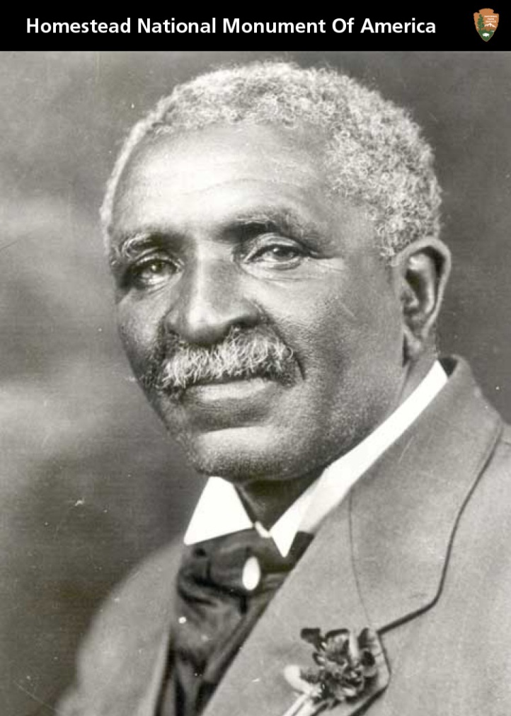 Black & white portrait of a Black man with gray hair and moustache