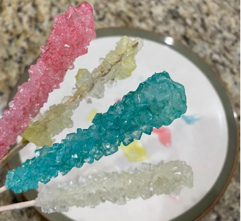 photo of pink, white, and turquoise crystalline rock candy